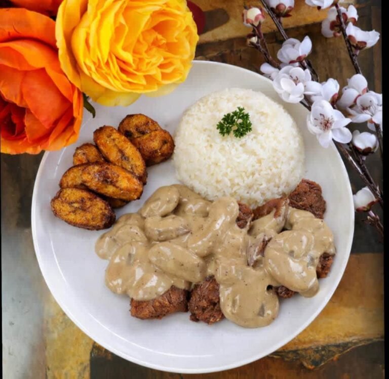 Pork mushroom sauce with jasmine rice and sweet plantain